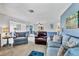 Relaxing living room with comfy armchairs, sofa, and stylish decor, creating a cozy atmosphere at 3721 Somerville Dr # 1513, Sarasota, FL 34232