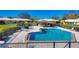 Wonderful community pool with comfortable lounge furniture, perfect for enjoying sunny days at 3721 Somerville Dr # 1513, Sarasota, FL 34232