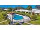 Inviting community pool and lounge area, ideal for relaxation and socializing at 3721 Somerville Dr # 1513, Sarasota, FL 34232