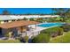 Fantastic community pool with cabana-covered dining area, perfect for poolside gatherings at 3721 Somerville Dr # 1513, Sarasota, FL 34232