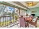 Bright dining area features a beautiful view of the lake and fountain at 3810 75Th W St # 128, Bradenton, FL 34209