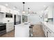 Stylish, updated kitchen featuring quartz countertops, stainless steel appliances, and ample cabinet space at 3915 Meadow Creek Dr, Sarasota, FL 34233