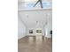 Spacious living area with tile flooring, high ceilings, and ample natural light from windows at 3915 Meadow Creek Dr, Sarasota, FL 34233