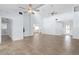 Open-concept living space featuring tile floors and views into the kitchen area at 3915 Meadow Creek Dr, Sarasota, FL 34233