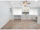 Custom built-ins and neutral color palette highlight the large, light, and airy office space at 3915 Meadow Creek Dr, Sarasota, FL 34233