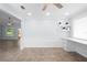 Light and airy office space with large window, custom built-ins, and a neutral color palette at 3915 Meadow Creek Dr, Sarasota, FL 34233