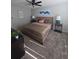 Comfortable bedroom with carpet, ceiling fan and tasteful décor, creating a serene retreat at 4001 Beneva Rd # 319, Sarasota, FL 34233