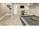 Fun game room with pool table, dart board, and TV at 4001 Beneva Rd # 319, Sarasota, FL 34233