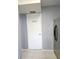 Hallway leading to the laundry room at 4001 Beneva Rd # 319, Sarasota, FL 34233