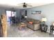 Bright living room area complemented by a stylish dining set and beach-themed accents at 4001 Beneva Rd # 319, Sarasota, FL 34233