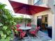 Private patio area with comfortable seating and dining set at 4001 Beneva Rd # 319, Sarasota, FL 34233