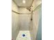 Updated shower with modern tile and rainfall shower head at 4001 Beneva Rd # 319, Sarasota, FL 34233