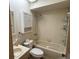 Bathroom featuring a shower over tub combination, and ample storage at 4199 66Th Street W Cir # 4199, Bradenton, FL 34209