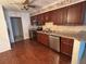 Well-equipped kitchen with stainless steel appliances and wood cabinets, offering both style and functionality at 4199 66Th Street W Cir # 4199, Bradenton, FL 34209