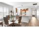 Dining area adjacent to a kitchen with granite countertops and modern appliances at 4440 Fairways Blvd # 310, Bradenton, FL 34209