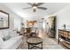 Bright living room with comfortable seating and views into the dining and kitchen areas at 4440 Fairways Blvd # 310, Bradenton, FL 34209