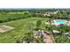 Aerial view of park including playground, green space, and community pool at 4531 Useppa Dr, Bradenton, FL 34203