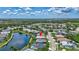 Neighborhood aerial showcasing the property's location near a picturesque lake at 4531 Useppa Dr, Bradenton, FL 34203