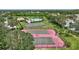 Aerial view of community sports amenities including tennis, basketball, and pool at 4531 Useppa Dr, Bradenton, FL 34203