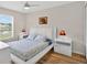 Bright bedroom with neutral walls, modern furnishings, and a ceiling fan at 4531 Useppa Dr, Bradenton, FL 34203