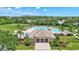 The community center overlooks a pool and common green space with tropical landscaping at 4531 Useppa Dr, Bradenton, FL 34203