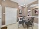 A formal dining area near the kitchen provides an intimate space for meals and entertaining guests at 4531 Useppa Dr, Bradenton, FL 34203
