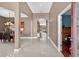 Bright and open foyer with archways leads to a dining room and living area at 4531 Useppa Dr, Bradenton, FL 34203
