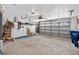 Spacious garage with ample storage space and a large garage door at 4531 Useppa Dr, Bradenton, FL 34203