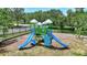 Community playground with slides, climbing wall, and bridge for  at 4531 Useppa Dr, Bradenton, FL 34203