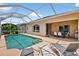 A view of the lovely sparkling pool and patio area, ideal for relaxing and entertaining at 4531 Useppa Dr, Bradenton, FL 34203