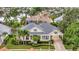 Beautiful home situated on a lush lot with an attached carport and mature palms at 4727 Starboard Dr, Bradenton, FL 34208