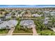 Aerial view of a beautiful home with lush landscaping in a desirable neighborhood at 4727 Starboard Dr, Bradenton, FL 34208