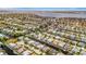 An aerial view of a waterfront neighborhood showcasing canals and the beautiful homes along the water at 4727 Starboard Dr, Bradenton, FL 34208