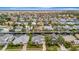 A scenic aerial view of a waterfront community with homes and a canal at 4727 Starboard Dr, Bradenton, FL 34208