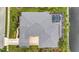 Aerial view showcases the house, pool, and waterway at 4727 Starboard Dr, Bradenton, FL 34208