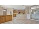 View of the kitchen showcasing wooden cabinetry, countertops, and modern appliances at 4727 Starboard Dr, Bradenton, FL 34208