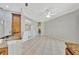 Open-concept living room with tile floors at 4727 Starboard Dr, Bradenton, FL 34208