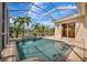 Relaxing screened-in pool area with beautiful, clear blue water to unwind in at 4727 Starboard Dr, Bradenton, FL 34208