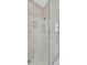 Modern walk-in shower with glass door and tiled walls at 4727 Starboard Dr, Bradenton, FL 34208