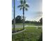 Scenic vacant lot featuring lush greenery and beautiful landscaping details with palm trees at 481 Saturn Ave, Sarasota, FL 34243