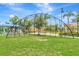 Community batting cage is adjacent to lush landscaping at 5005 Torrey Pines Run, Bradenton, FL 34211