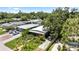 Aerial view of the house showing the surrounding landscape, driveway, and neighboring homes at 5317 14Th S Ave, Gulfport, FL 33707