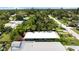 Bird's eye view of a single story home shaded by a large tree with a light blue exterior at 5317 14Th S Ave, Gulfport, FL 33707