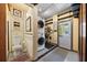 Well-equipped laundry room with stackable washer/dryer and access to the outdoors at 5317 14Th S Ave, Gulfport, FL 33707