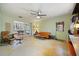 Relaxing living room featuring a sliding door and retro decor at 5317 14Th S Ave, Gulfport, FL 33707