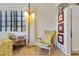 Cozy living room showcasing a comfortable chair and lots of natural light at 5317 14Th S Ave, Gulfport, FL 33707