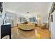 Bright living room featuring hardwood floors, natural light, and comfortable mid-century seating at 5317 14Th S Ave, Gulfport, FL 33707