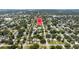Aerial view pinpointing a house in a residential area surrounded by lush greenery at 5317 14Th S Ave, Gulfport, FL 33707