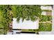 Aerial top-down view of a home roof with foliage and surrounding landscape at 5317 14Th S Ave, Gulfport, FL 33707