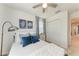 Well-decorated bedroom features a ceiling fan and a closet at 5711 Archipelago St, Nokomis, FL 34275